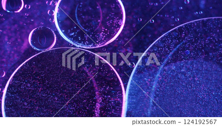 Blur bubbles. Oil emulsion. Purple blue neon colorful acrylic texture water round fluid spreading on abstract art light background. 124192567