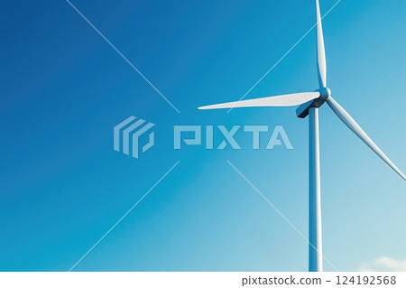 Wind Energy in Action Under a Clear Blue Sky 124192568