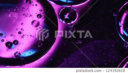 Molecular texture. Oil background. Defocused blue purple neon colorful drop sequins round water swirling on art light abstraction. 124192628
