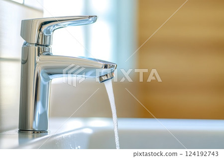 Close-Up of Water Flowing from Tap 124192743