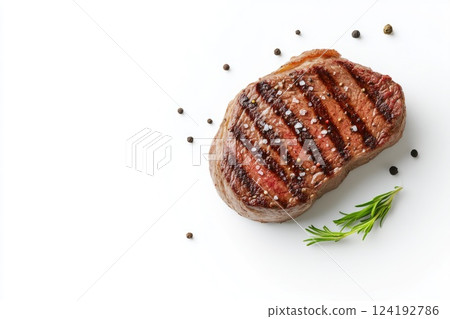 Close-Up of Grilled Beef Sirloin Steak on White Background 124192786