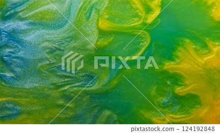 Ink water. Acid liquid. Defocused yellow green blue colorful shiny emulsion chemical marble texture floating on abstract background. Ink water. Acid liquid. Defocused yellow green blue colorful shiny emulsion chemical marble texture floating on abstract background. 124192848
