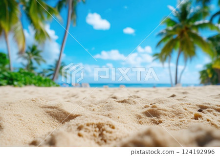 Sun-Kissed Sand Close-Up with Distant Palms 124192996