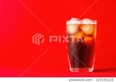 Vibrant red background with refreshing drink 124193228