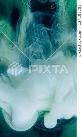Pigment splash. Fume paint explosion. White green vapor stream swirl mix shape on black background. Blur color haze abstract dye drop wave spill. 124193285