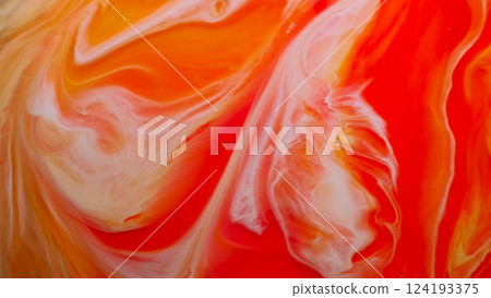 Paint splash. Marble texture. Defocused orange yellow color ink in water oil emulsion fluid blend spreading on abstract art background. 124193375
