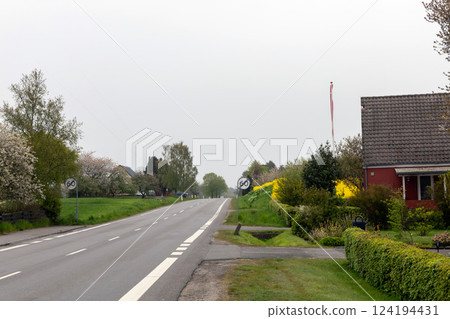Empty highway early in the morning. Natural landscape. Empty highway early in the morning. Natural landscape. 124194431