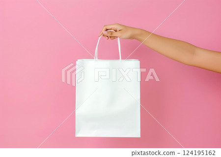 woman Hand holding white Shopping bag for mockup . AI generated image 124195162