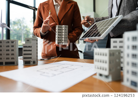 House model with agent asking costumer for contract to buy, get insurance or loan real estate or property 124196253