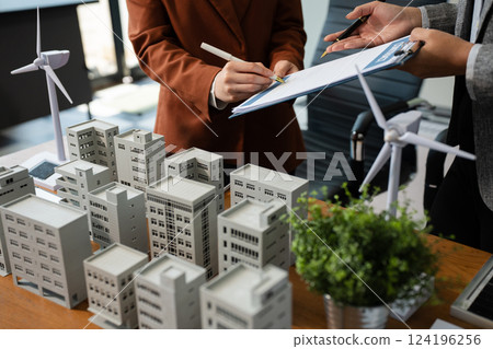 House model with agent asking costumer for contract to buy, get insurance or loan real estate or property House model with agent asking costumer for contract to buy, get insurance or loan real estate or property 124196256