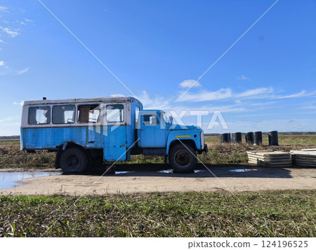 An old bus in clear weather in the countryside An old bus in clear weather in the countryside 124196525