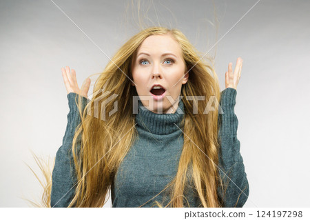 Girl long hair surprised face expression 124197298