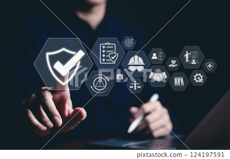 Work Safety and Compliance Concept, Safety First, A person with work safety and compliance icons, including a shield, hard hat, checklist, workplace safety, health protocols, and regulatory compliance 124197591