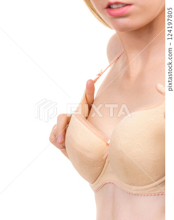 Female wearing too big bra 124197805