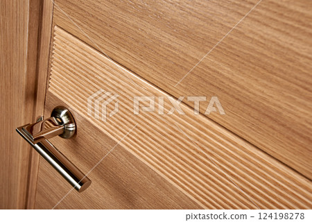 Closed wooden door Closed wooden door 124198278