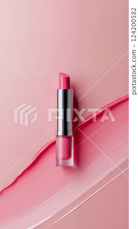 A pink lipstick on a pink background A pink lipstick on a pink background 124200582