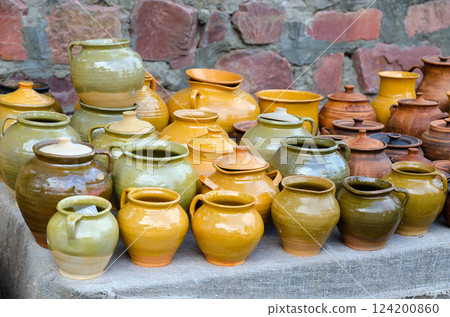 Exhibition and sale of ceramic tableware on city street, Gomel, Belarus 124200860