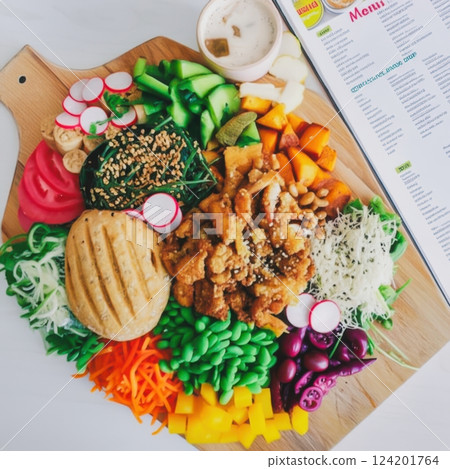 Vibrant Veggie Platter Meal An Eye Catching Food Arrangement On Wooden Board With Purple Accents, Coffee, And Smoothie, Featuring Fresh Vegetables And Protein For Delicious Experience 124201764