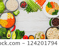 Vibrant Farm to Table Meal Prep Colorful Lay Of Fresh, Raw Ingredients Bowls Of Variety On White Table, Offering Healthy Option For Delicious And Wholesome Meal, Featuring Colorful Vegetables 124201794