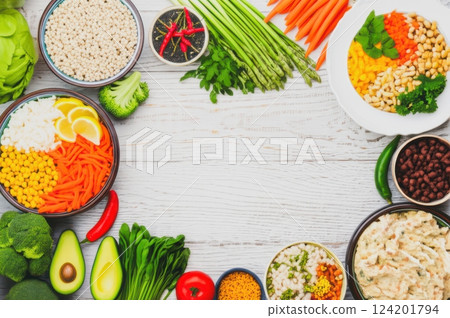 Vibrant Farm to Table Meal Prep Colorful Lay Of Fresh, Raw Ingredients Bowls Of Variety On White Table, Offering Healthy Option For Delicious And Wholesome Meal, Featuring Colorful Vegetables 124201794
