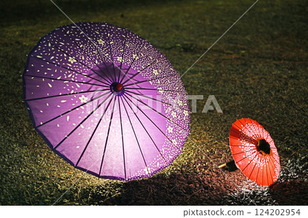 Colorful illuminated Japanese umbrellas 124202954