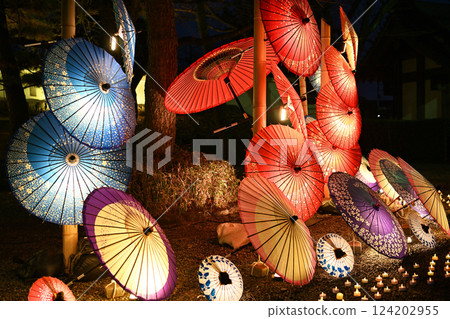 Colorful illuminated Japanese umbrellas 124202955