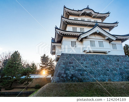 Winter evening view of the ruins of Nobono Castle, an impregnable castle that cannot be taken. The castle tower and moat 124204189