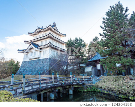 Winter evening view of the ruins of Nobono Castle, an impregnable castle that cannot be taken. The castle tower and moat 124204198