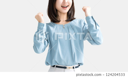 Woman/businesswoman doing a fist pump Woman/businesswoman doing a fist pump 124204533