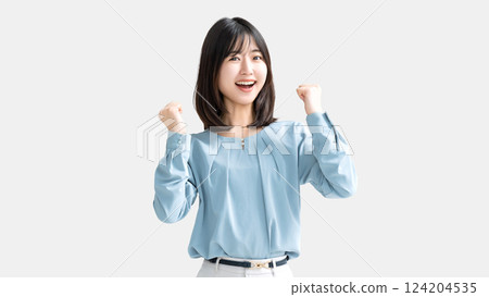 Woman/businesswoman doing a fist pump Woman/businesswoman doing a fist pump 124204535