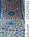 Majolica tile pattern on a madrasah. Samarkand, Uzbekistan. An example of the art of Central Asia. 124204642