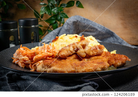 Breaded chicken breast fillet. 124206189