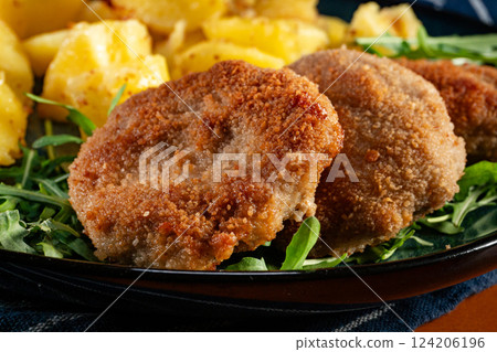 Meatballs with cheese served with boiled potatoes. Meatballs with cheese served with boiled potatoes. 124206196