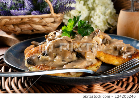 Potato cutlets with mushroom sauce. 124206246