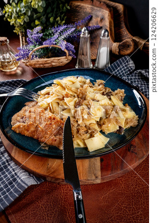 Pasta with sauerkraut and mushrooms. Pasta with sauerkraut and mushrooms. 124206629