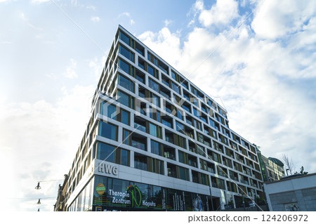 Modern shopping mall and business center outside 124206972