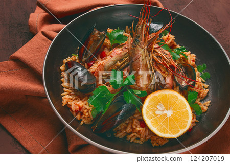 Seafood paella, shrimp and mussels risotto, rice, homemade, top view, no people, 124207019