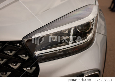 headlight of modern prestigious car close up 124207994