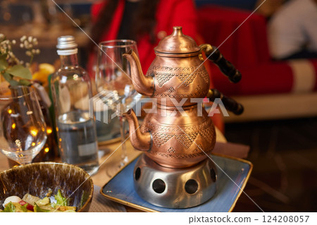 tea urn with glass of tea turkish style tea urn with glass of tea turkish style 124208057