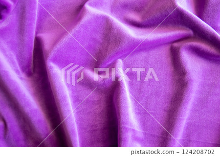 Lilac knitted texture fabric. Purple textile cloth background. Soft material for fashion clothes. 124208702