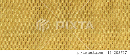 Texture yellow and golden fluffy fabric background with rhomboid pattern, macro. Abstract backdrop from ocher textile 124208737