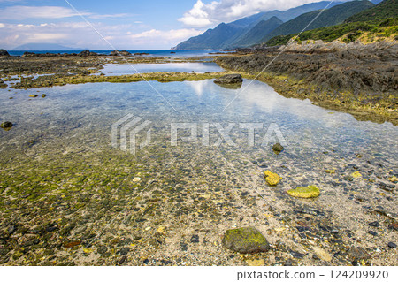 Tide pools at Kurio Coast in autumn, Yakushima National Park Tide pools at Kurio Coast in autumn, Yakushima National Park 124209920