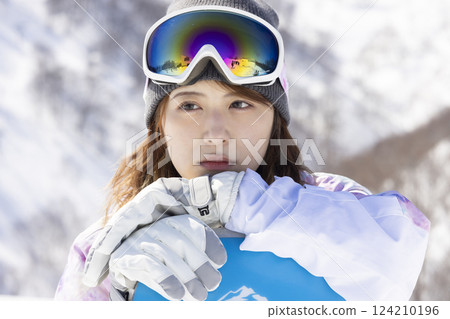 Woman enjoying ski Woman enjoying ski 124210196