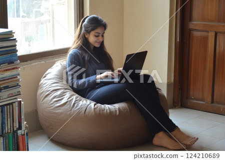 Remote work scenario cozy home office lifestyle content indoor environment close-up view comfort and productivity 124210689