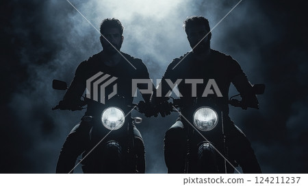 Motorcycle riders in dramatic foggy night urban setting mysterious atmosphere 124211237