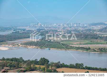 Scenery view of Ton Pheung district on the banks of Mekong River in Bokeo Province, Laos. View seen from Chiang Saen district. Scenery view of Ton Pheung district on the banks of Mekong River in Bokeo Province, Laos. View seen from Chiang Saen district. 124211885