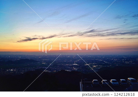 A fantastic evening view of the city sparkling from a high vantage point 124212618