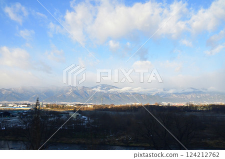 Early morning train window view from Akeshina Station to Matsumoto Station on the JR East Shinonoi Line (December 2022) 124212762