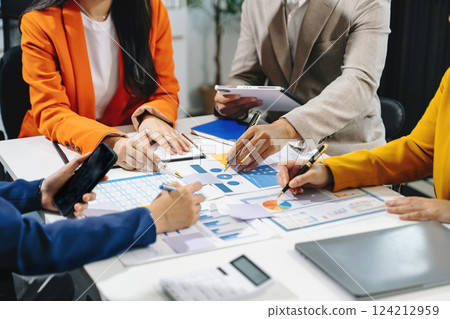 Business team meeting present.professional investor working with  Finance managers task. with laptop smart phone and digital tablet 124212959