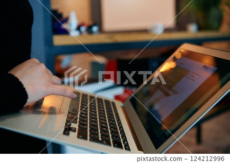 Close up of Hand Using Laptop in Office. Close up of Hand Using Laptop in Office. 124212996